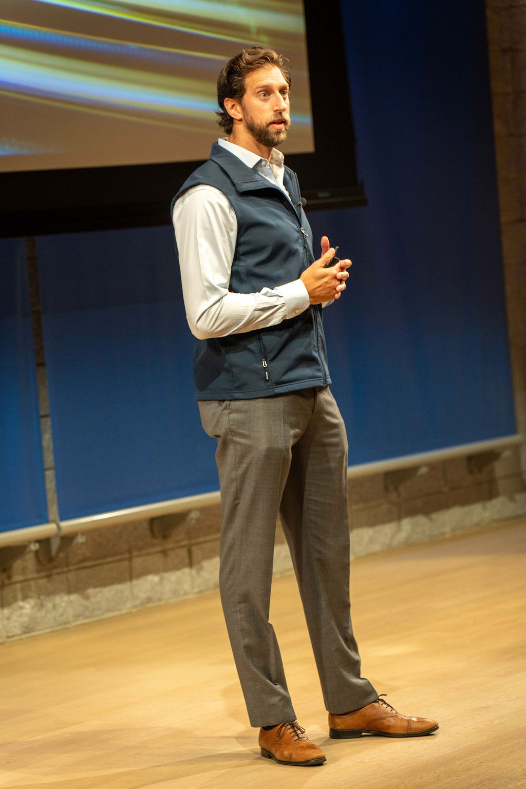 Founder presenting on stage