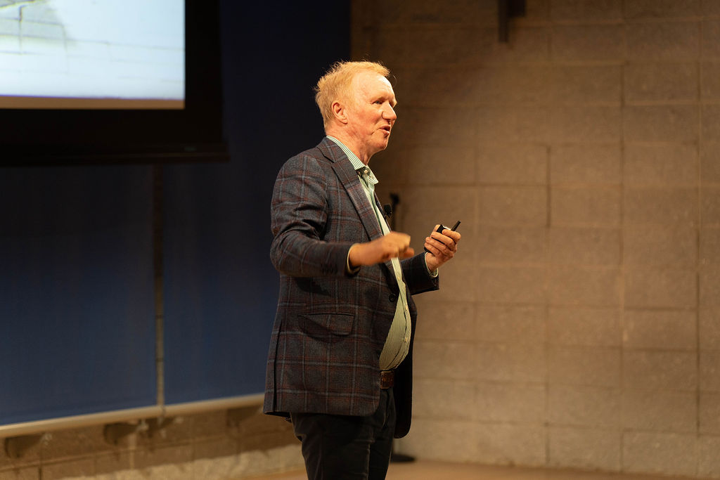 Founder presenting on stage