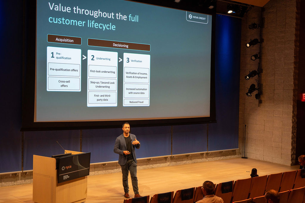 Nova Credit founder presenting customer lifecycle slide