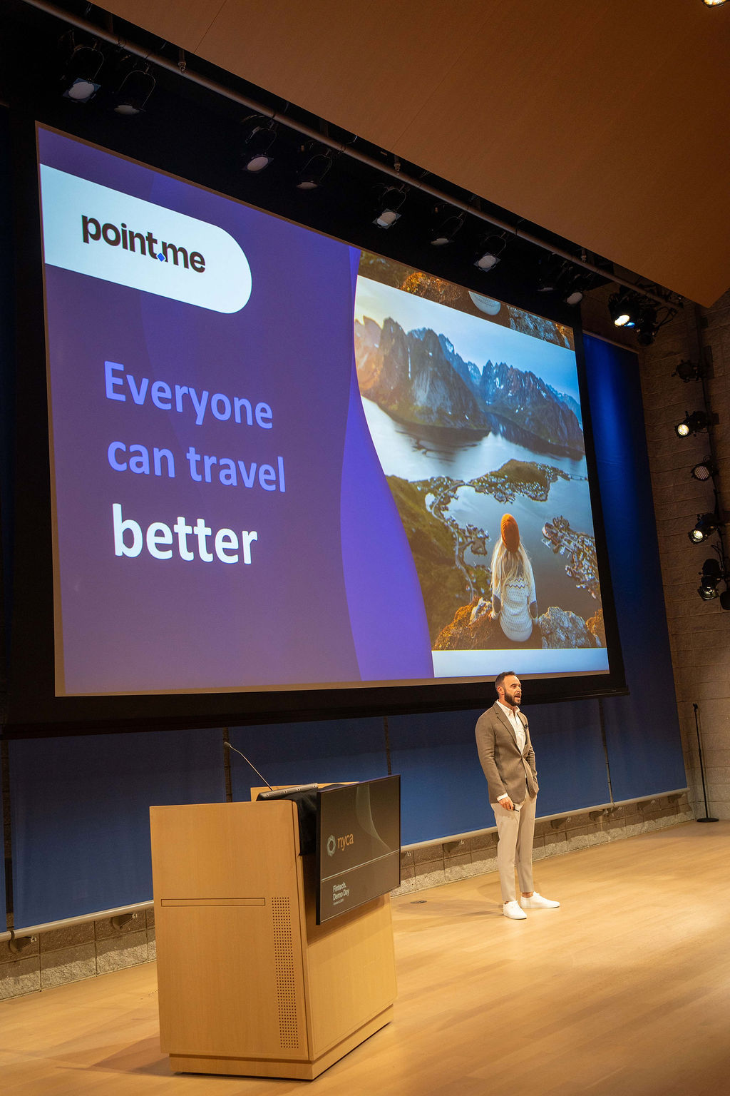 point.me founder presenting on stage